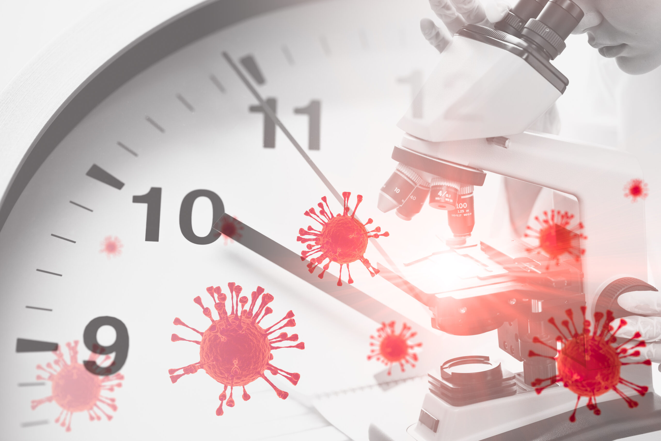An image of a clock is overlaid with partially transparent COVID-19 cells and a lab worker looking into a microscope